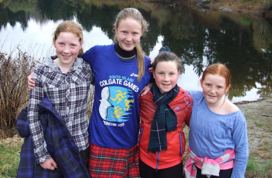 Caileigh Forbes (12) and Lauren Kitto (12), both of Roxburgh, Molly Marsh (10), of Ettrick, and...