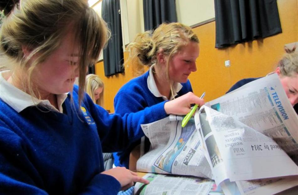 Cromwell College pupils Elsa Mannering (15), Larissa Schwass (14) and Bailey Jellyman (15) scan...