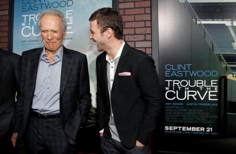 Clint Eastwood (L) and Justin Timberlake attend the premiere of 'Trouble with the Curve' in Los...