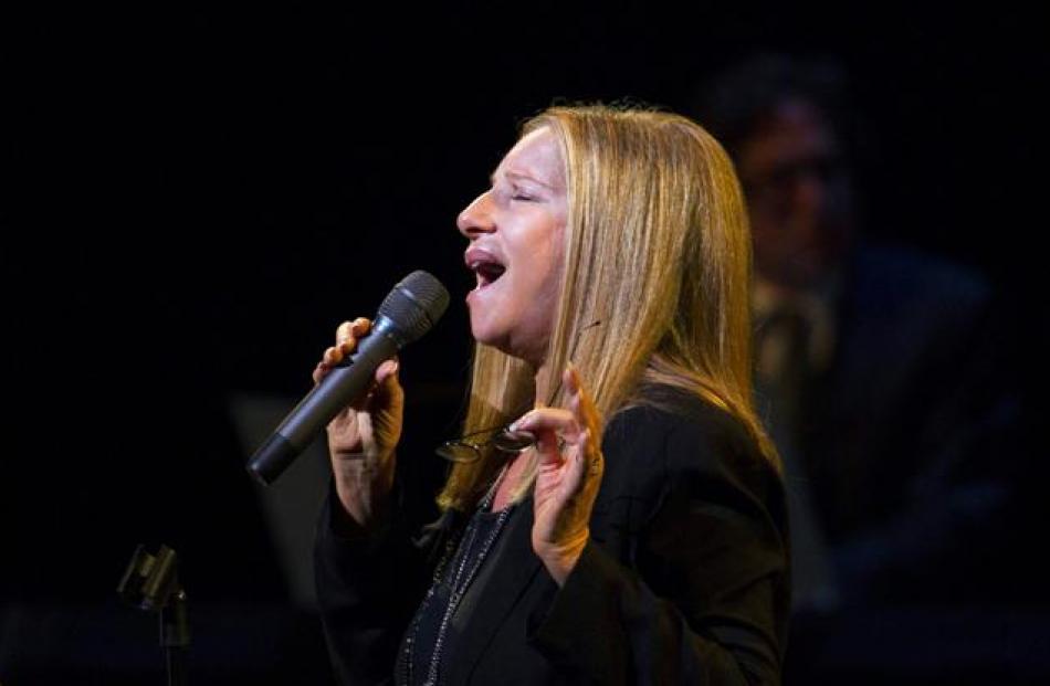 Singer Barbra Streisand performs during a tribute concert to composer Marvin Hamlisch in New York...