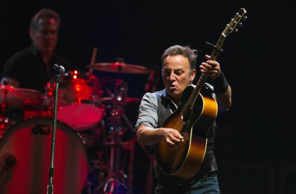 US musician Bruce Springsteen performs with the E Street Band during a concert in East Rutherford...