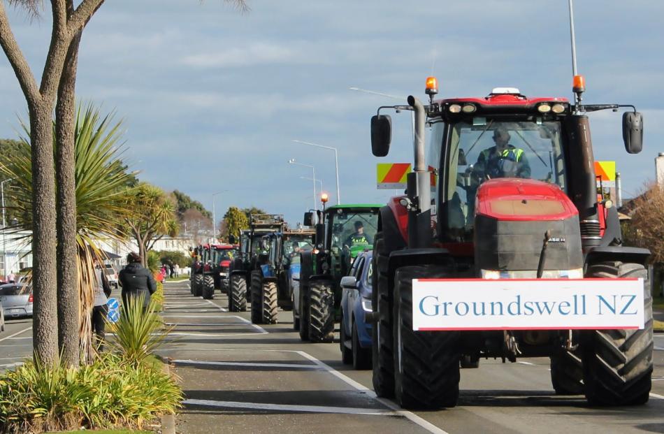 	Tractors drive along Yarrow St in Invercargill.PHOTO: LUISA GIRAO