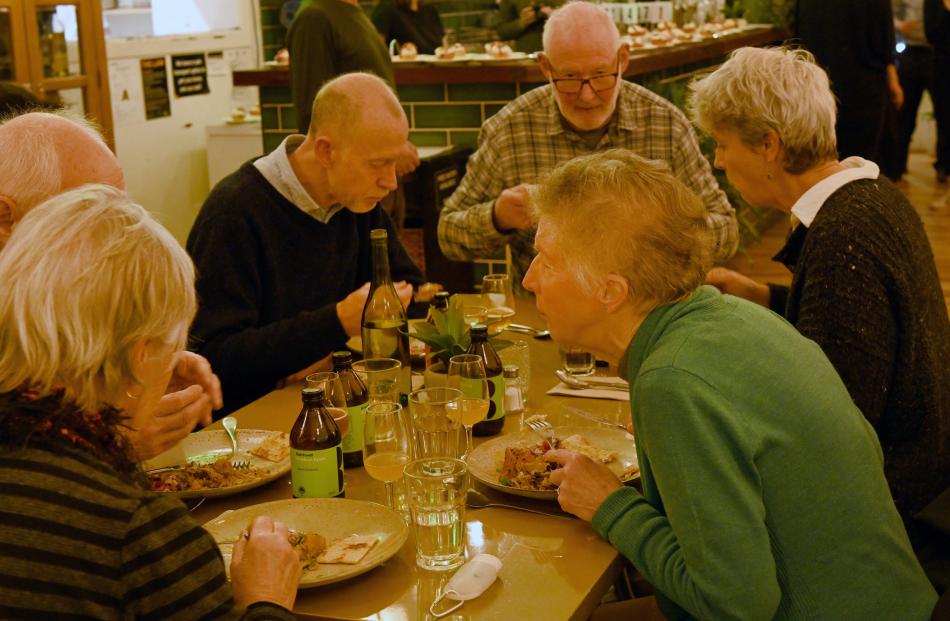 Diners enjoy the vegan upcycled meal at Kind Company.
