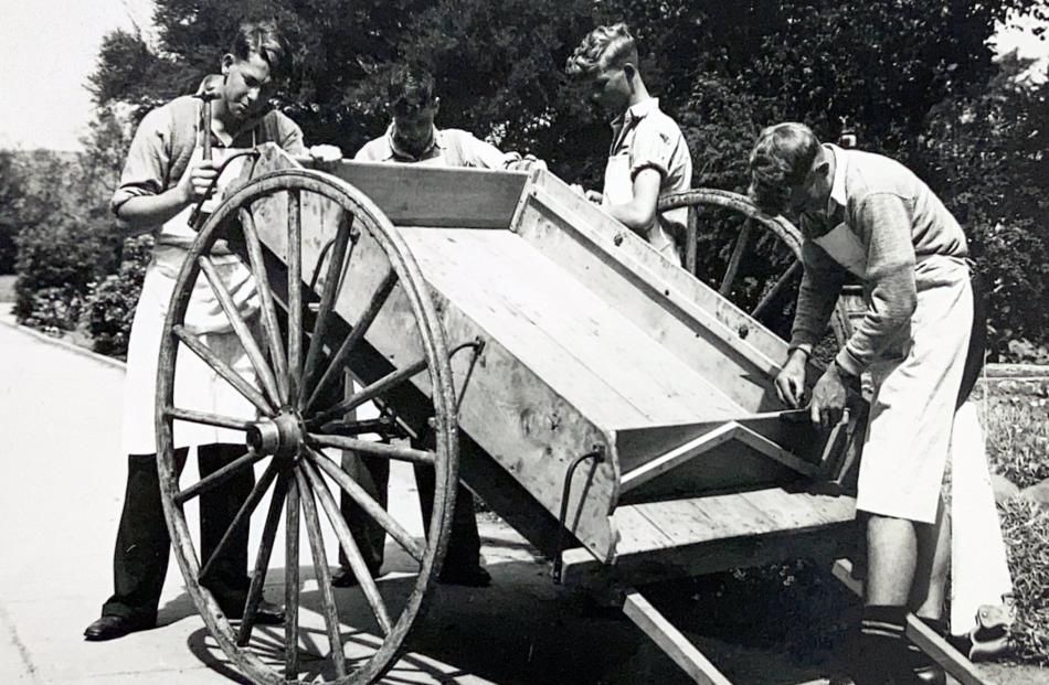A farm cart made by rural pupils is given finishing touches (undated).PHOTO: TAIERI COLLEGE