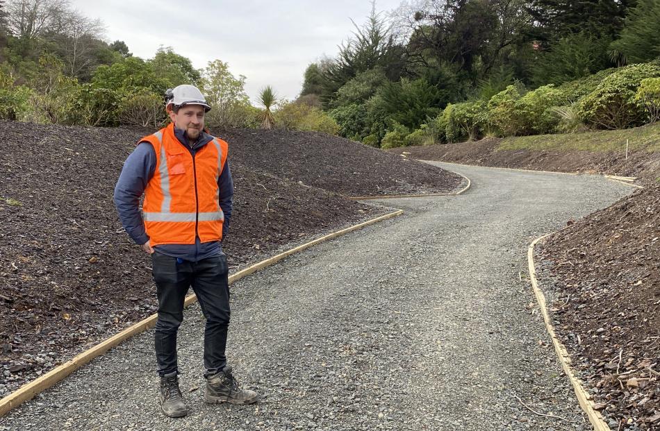 NZ Transport Agency senior project manager Jason Forbes stands on a section of shared pathway...