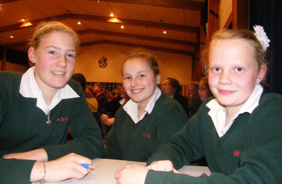Breanna McKinlay (12), Megan White (12) and Ella Bray (13) of Waimataitai School, Timaru, wait...