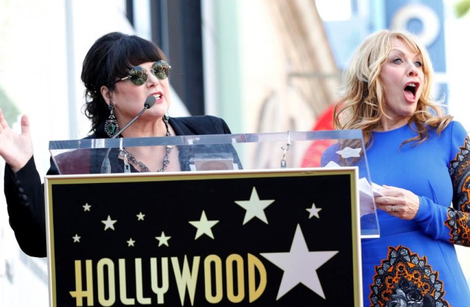 Ann (L) and Nancy Wilson of Rock band Heart attend the ceremony for the unveiling of their star...