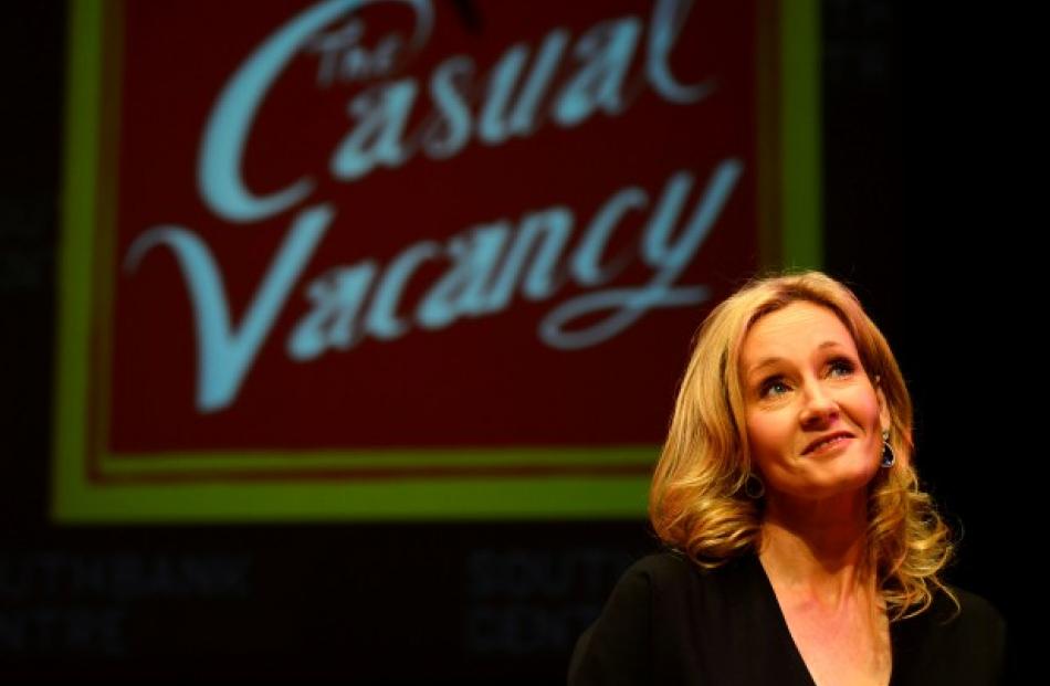 Author J.K. Rowling poses during an event to publicise her book 'The Casual Vacancy' at the Queen...