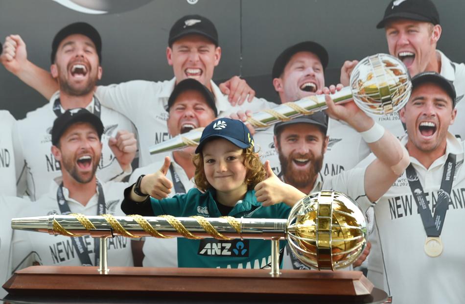 Giving two thumbs up behind the Mace trophy is Harris O’Sullivan (7), of Dunedin.PHOTO: PETER...