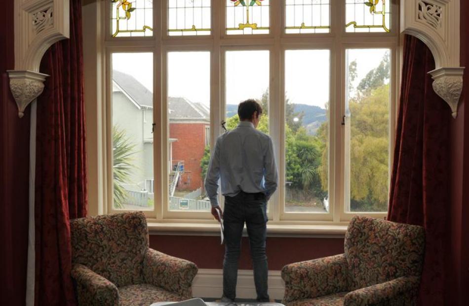 OUSA president and top-flat judge Logan Edgar admires the view from the flat.