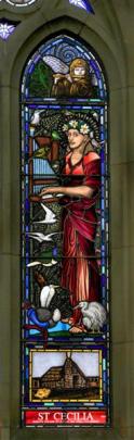 Dame Kiri Te Kanawa as St Cecilia in the newly installed stained glass window at St Paul's...
