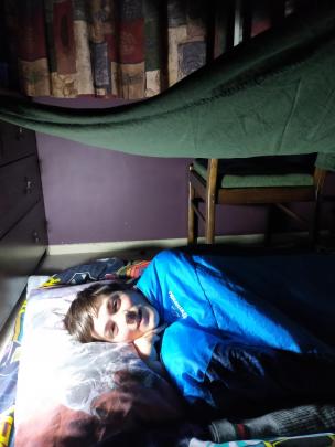 Xavier Bristow (11) creates a cosy camp in his bedroom during the Covid-19 Alert Level 4 lockdown...