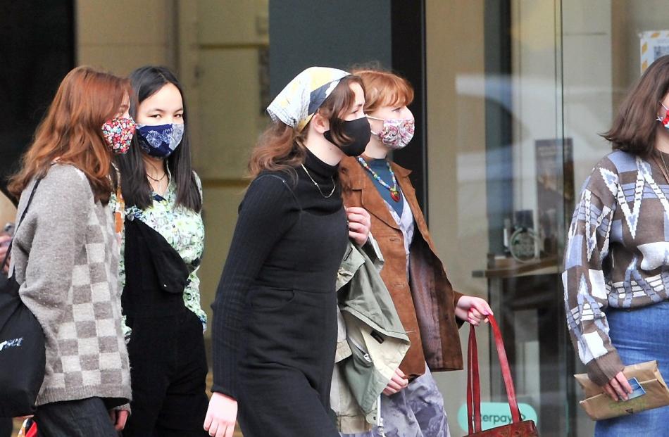 Shoppers in George St were wearing masks on the first day of Alert Level 2 restrictions yesterday...