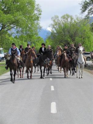 The cavalcade makes its way to the Glenorchy Waterfront Reserve.