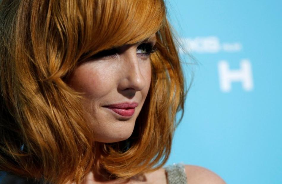 Cast member Kelly Reilly poses at the premiere of 'Flight' at the ArcLight Cinerama Dome in Los...