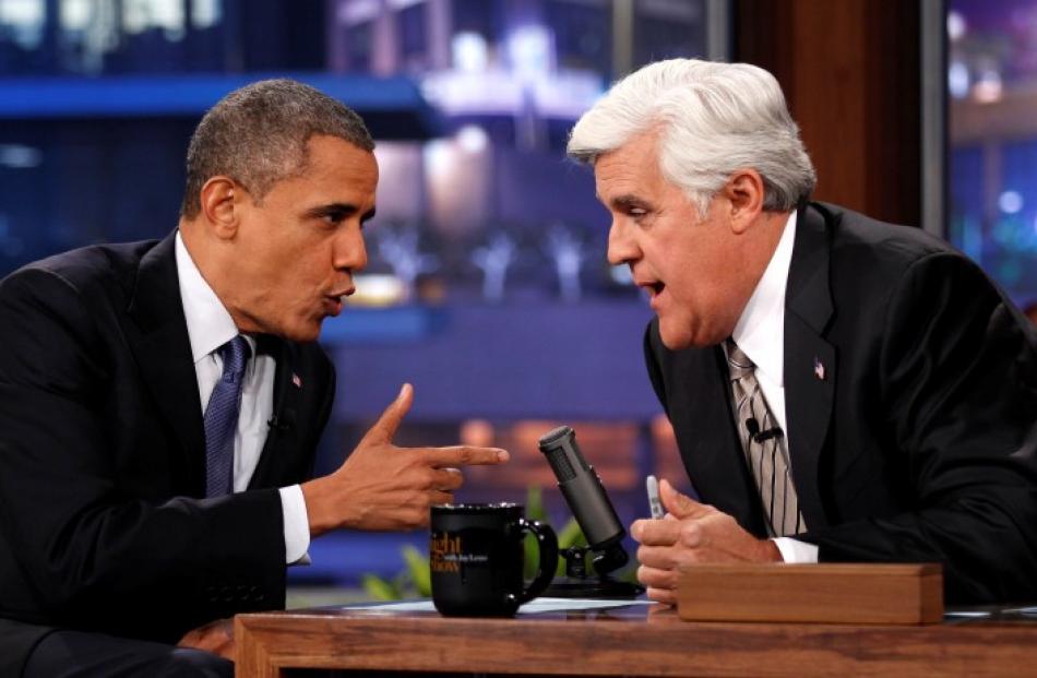 US President Barack Obama (L) makes an appearance on the Tonight Show with Jay Leno in Los...