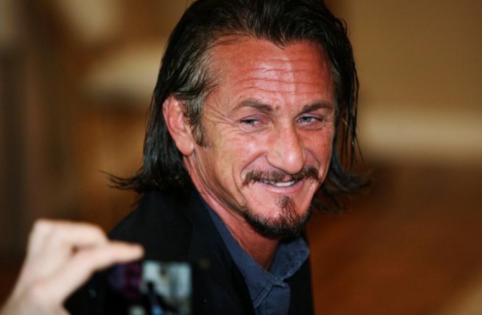 US actor Sean Penn attends a meeting with Bolivian President Evo Morales at the presidential...