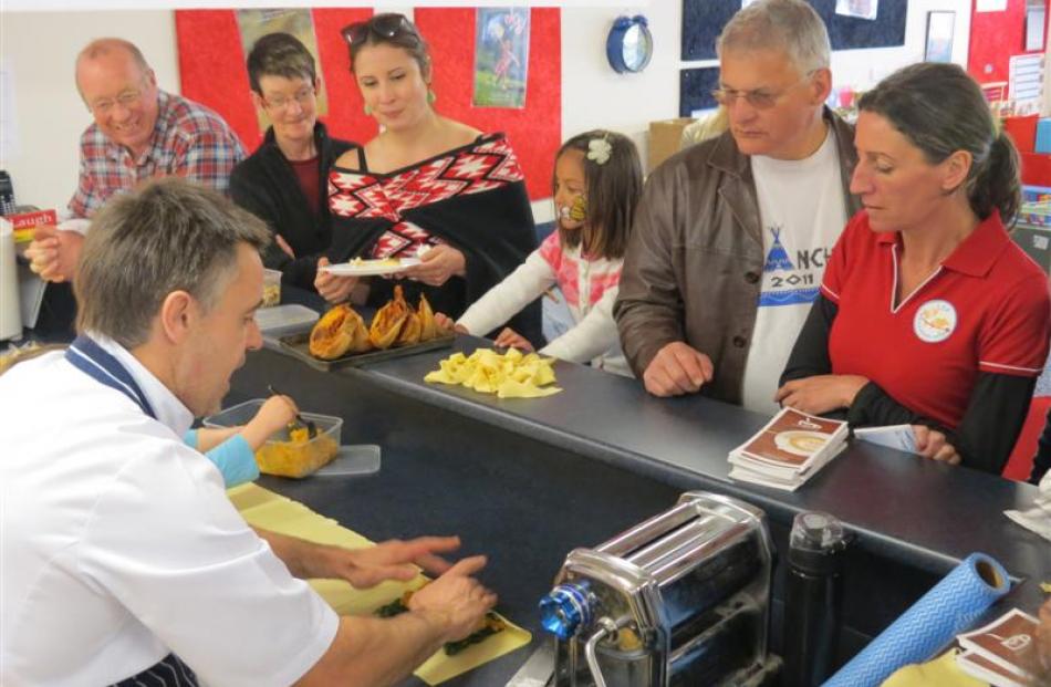 Wai Group chef Martin James, whose daughter attends KingsView Early Learning Centre, demonstrates...