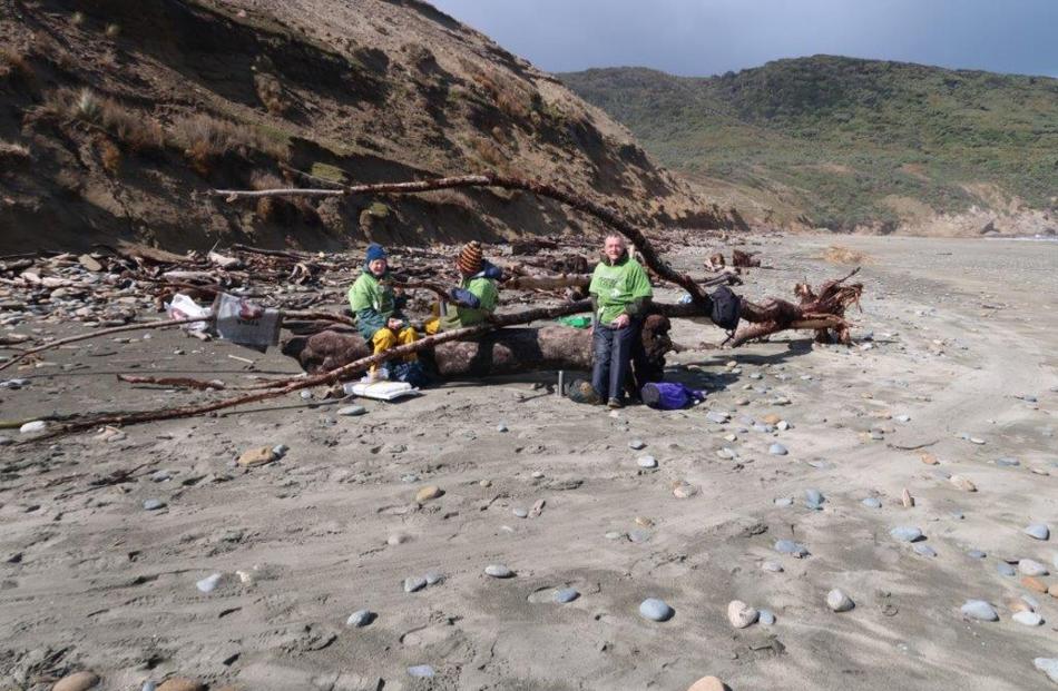 Volunteers collect rubbish at Stewart Island’s Mason Bay last week.