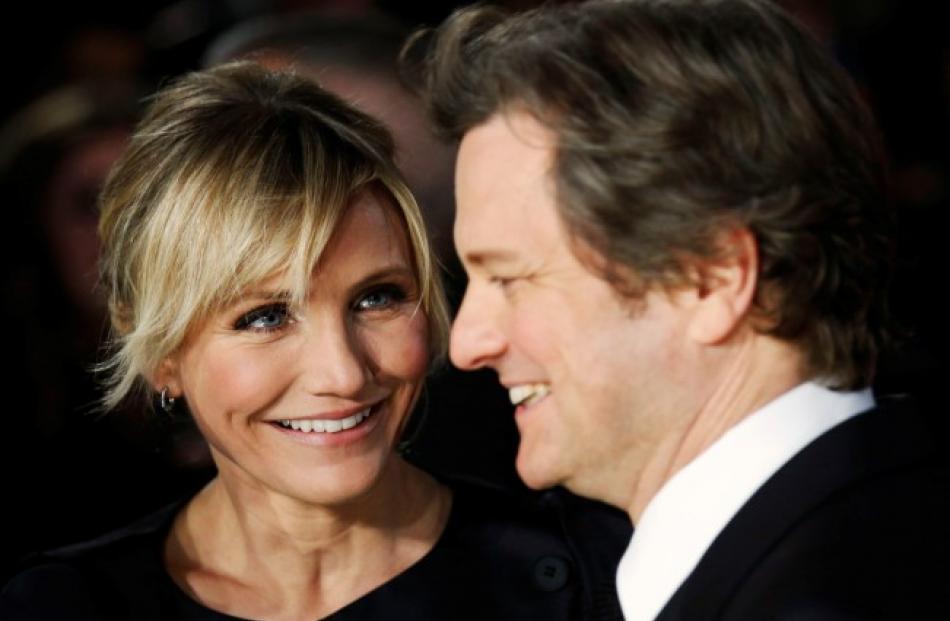 Cast members Cameron Diaz and Colin Firth (R) arrive for the world premiere of the film 'Gambit'...