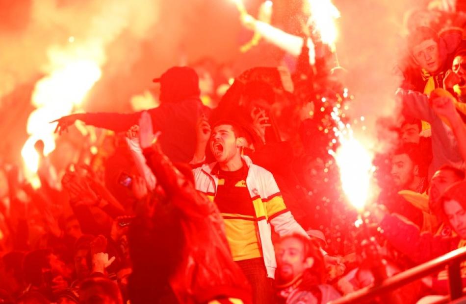 Fenerbahce's supporters react during their Europa League football match against AEL Limassol in...