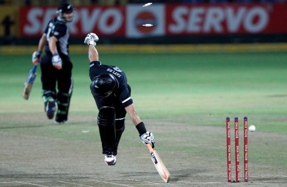 New Zealand captain Ross Taylor is run out by Sri Lanka's Jeevan Mendis during their third One...