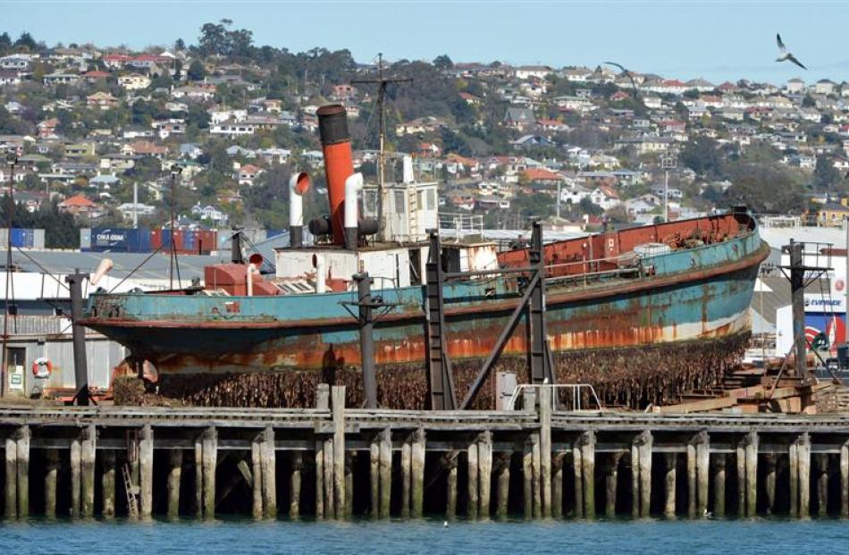 The historic steam dredge, Te Whaka, on the Birch St slip in September before being cut up,...