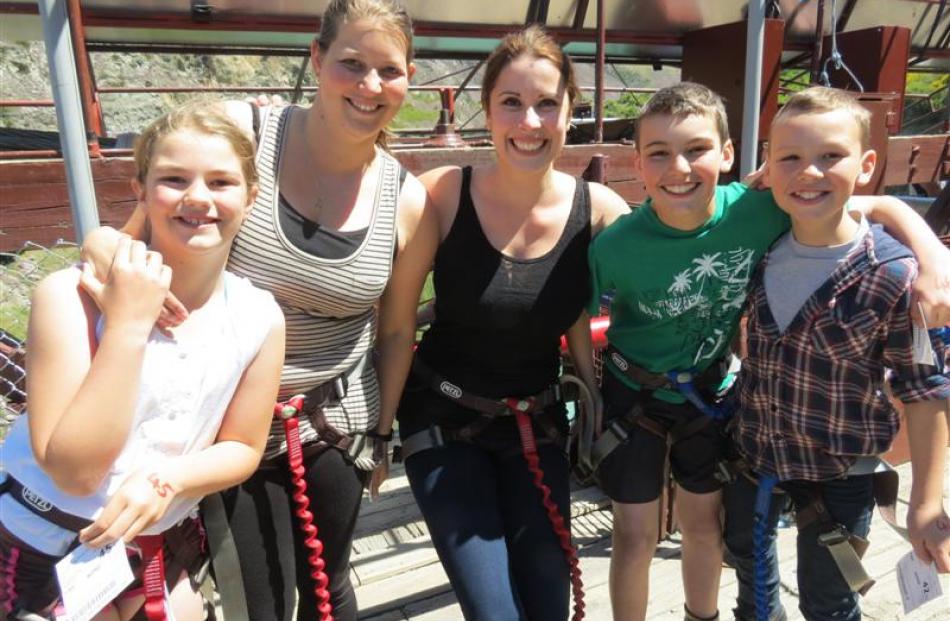 Bungy jumpers (from left) KingsView School pupil Mackenzie Shewan (10), teacher Marlene van...