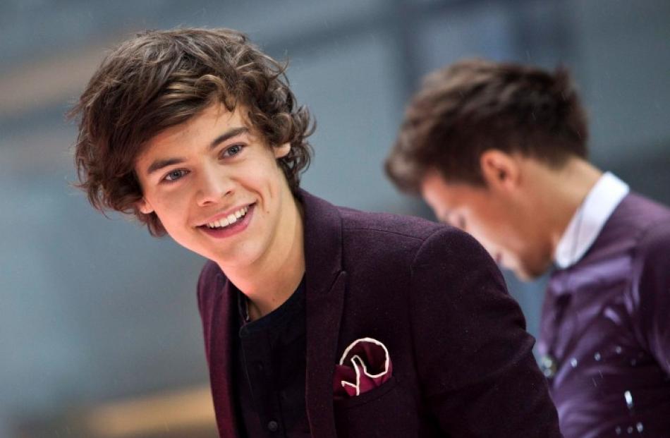 Harry Edward Styles performs with his band One Direction on NBC's Today show in New York. REUTERS...