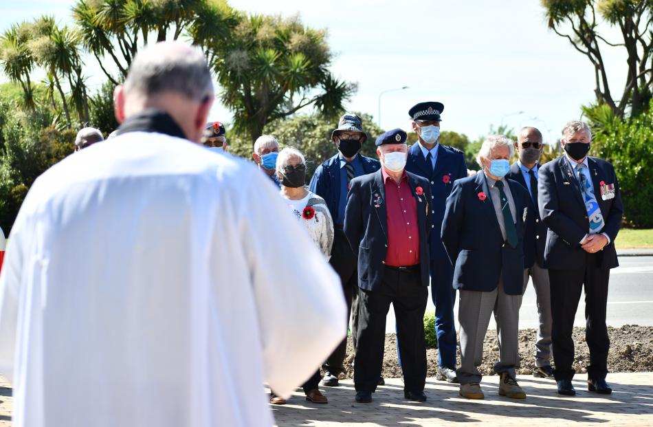 Father Tony Harrison led the Armistice Day service at the South Invercargill War Memorial this...