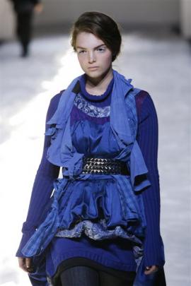 A model wears the same outfit at  Fashion Week, in Auckland in September 2007. Photo from NZ Herald.