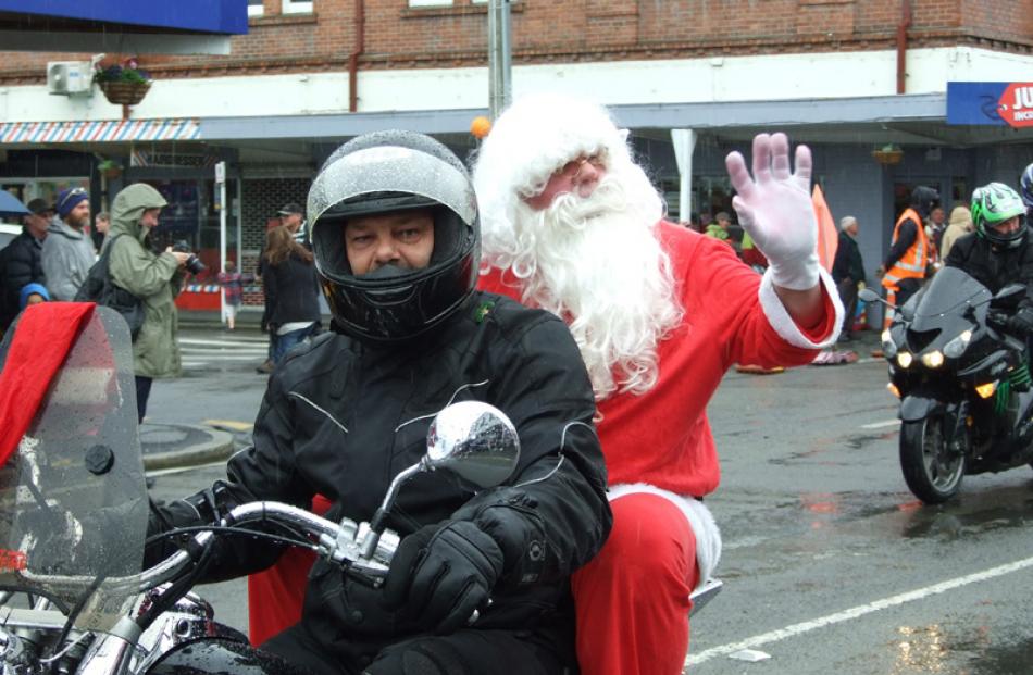 Santa hitches a ride with the Big River Bikers.