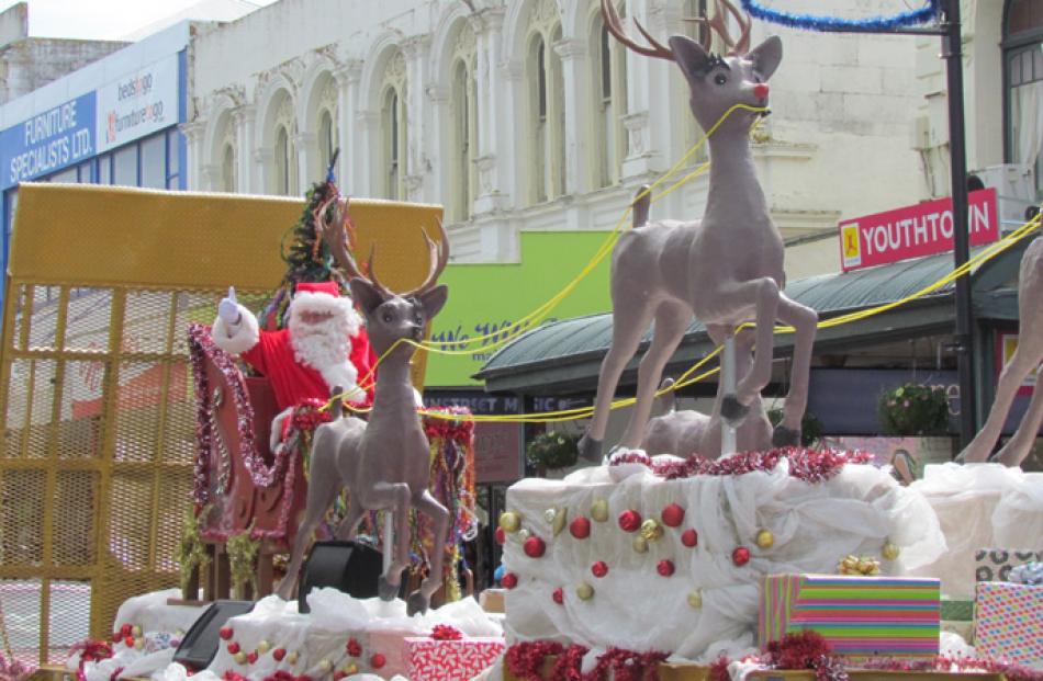 Oamaru's Santa parade passes down Thames St on Sunday.