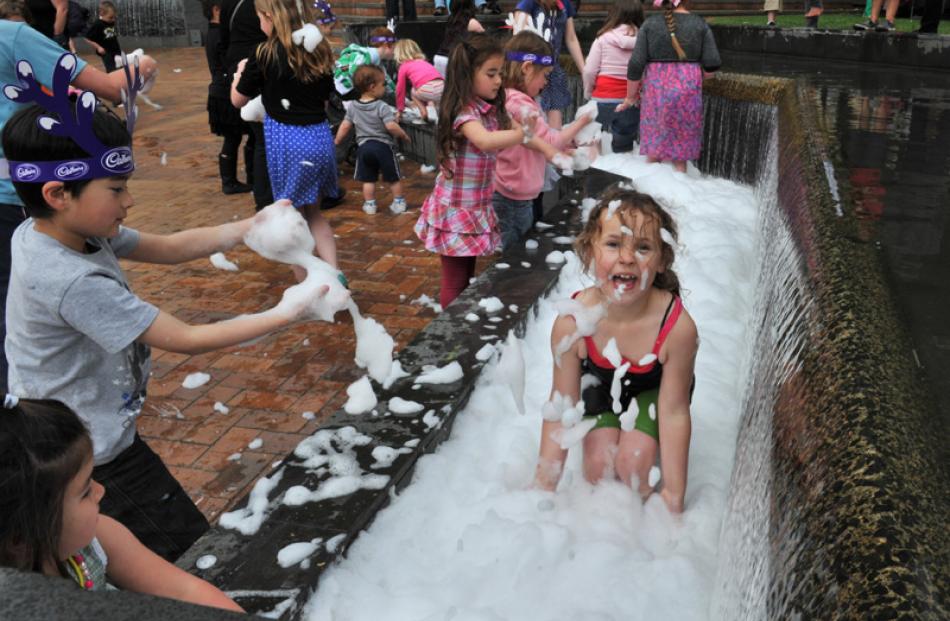 Saffron Lewis-Phillips (6) in the foam-filled Octagon fountain.