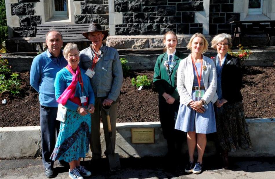 In front of the Nancy Steen Memorial Garden at Columba College are (from left) garden instigator...