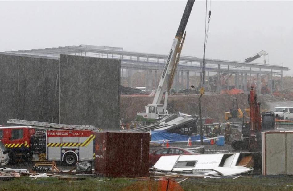 The building site where three workers were killed in yesterday's tornado. Photo Reuters.