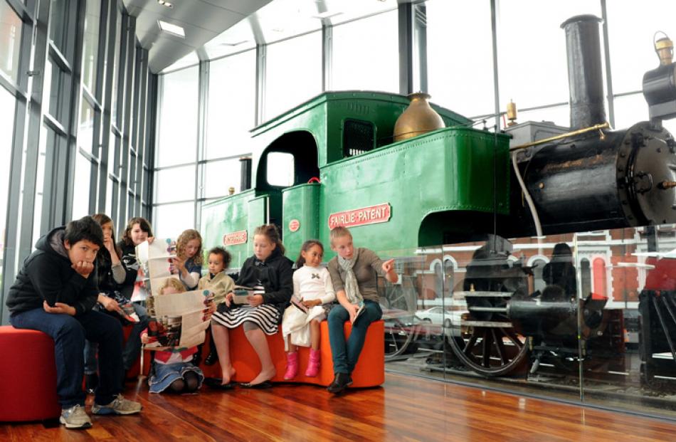 Children gather near Josephine, a double-ended Fairlie steam locomotive.
