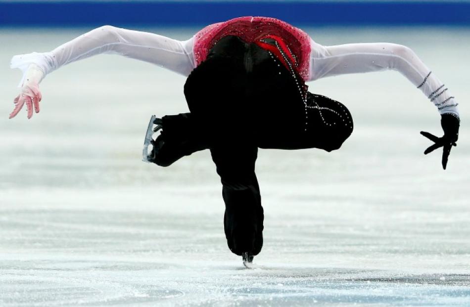 Yuzuru Hanyu of Japan performs during the men's free skating competition at the ISU Grand Prix of...