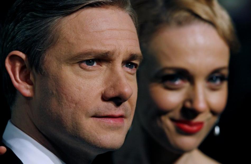 Actor Martin Freeman and his partner Amanda Abbington arrive for the royal premiere of the film ...