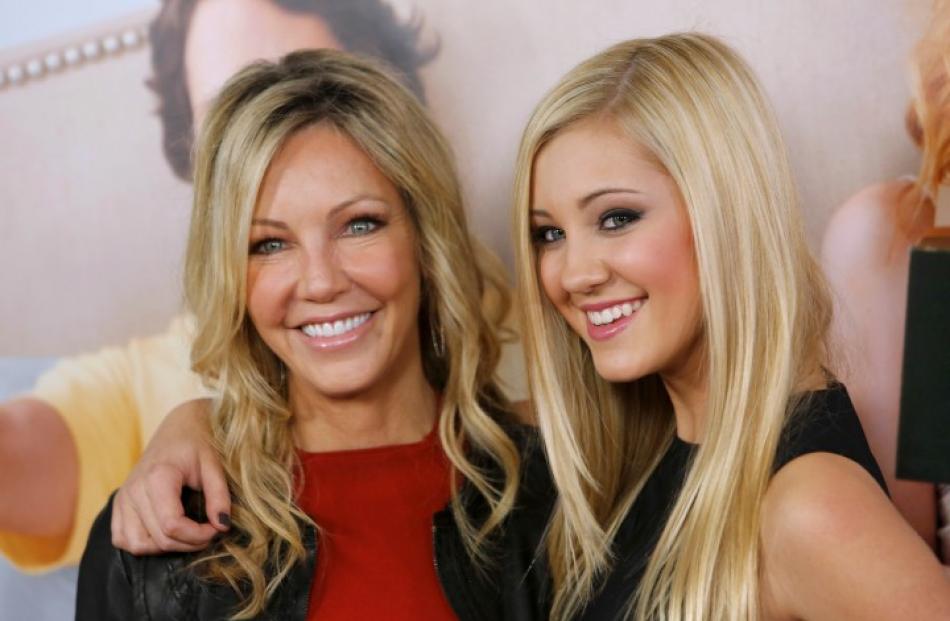 Actress Heather Locklear and cast member Ava Sambora (R) arrive at the premiere of the movie ...