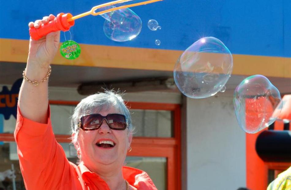 Rotary Club of Taieri member Christine McKay makes bubbles. Photos by Gerard O'Brien.
