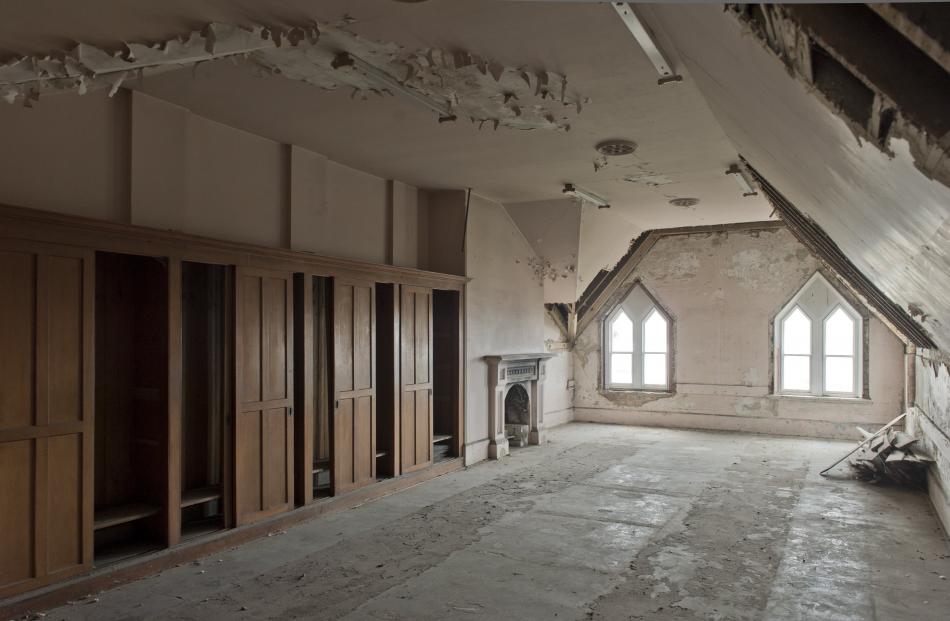The boarders’ dressing room, with wardrobes along one side.