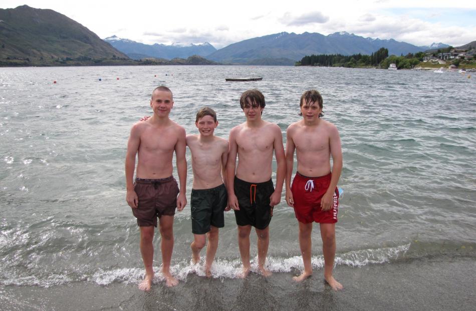 Enjoying the lake on New Year's Eve in Wanaka were (from left) Fergus Millar (14), of Dunedin, Sam Lawson (14), of Dunedin, George Holland (14), of Wanaka, and Oscar Crowe (13) of Wanaka : PHOTO: MARJORIE COOK