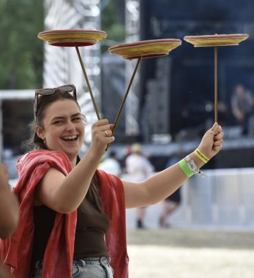 Trying her hand at a new skill is Maddie Harris, of Christchurch, at the Rhythm & Alps festival...