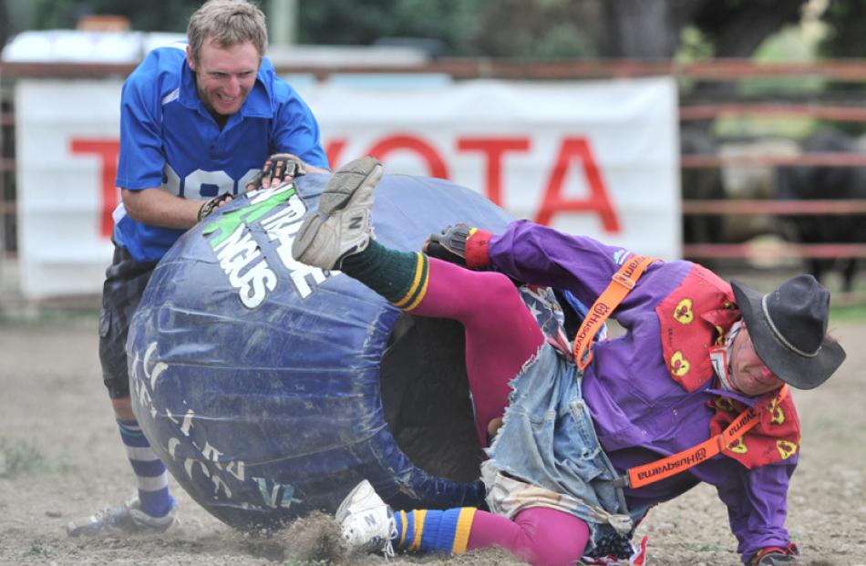 Bull fighter Alec Watson and clown Richard Robinson entertain the crowd