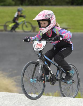 Kensi Parker is hard to miss in her snazzy pink helmet.