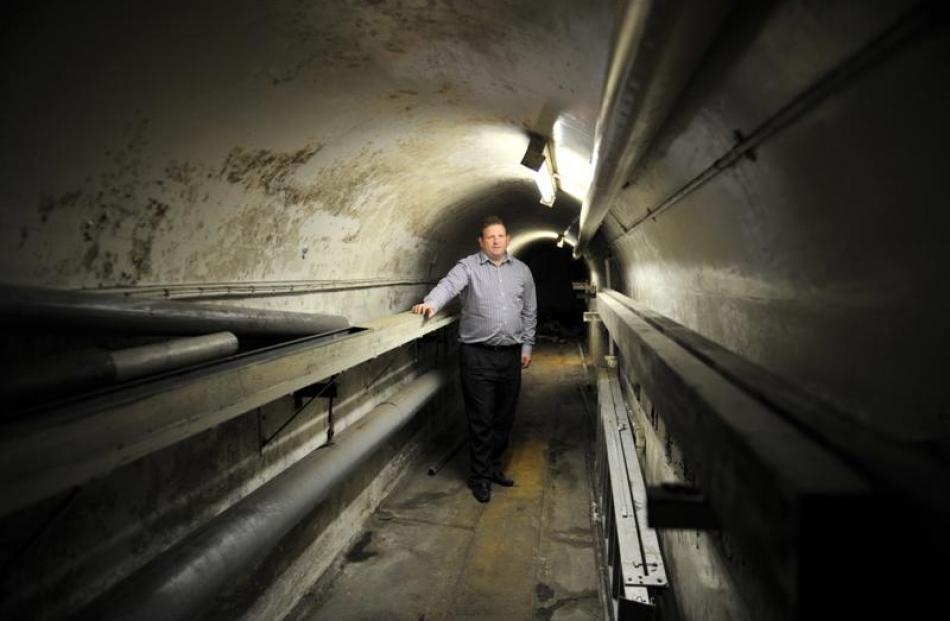 Speight's tour manager Chris Snow explores a 25m tunnel under Rattray St linking the brewery with...