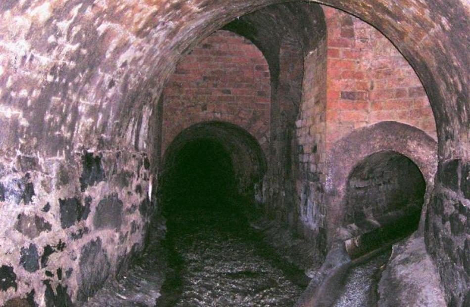 The view from inside the Rattray St sewer, built of brick in 1861, taken more than a century...
