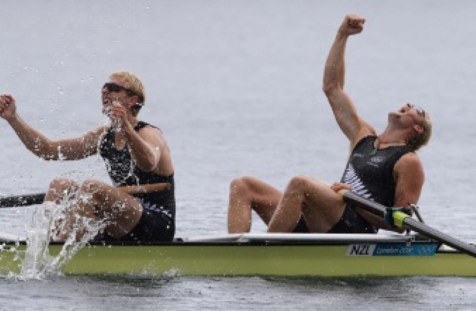 Hamish Bond and Eric Murray celebrate winning gold in the men's pair at the Games. Photo by The...