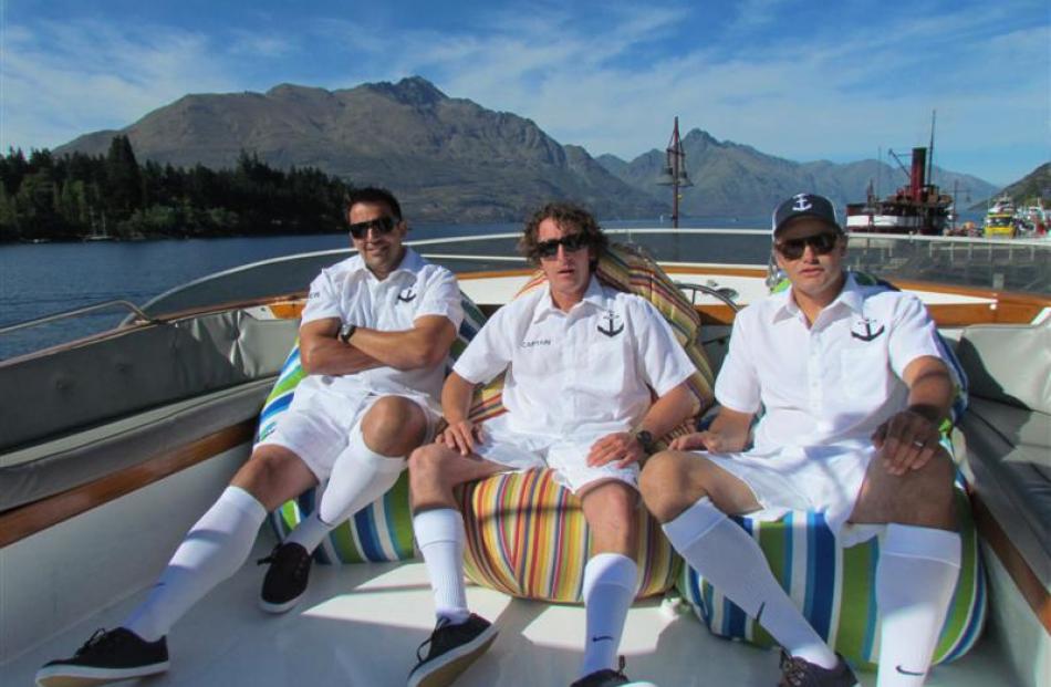 Marcus Barnett (left), Andre Cockburn and Anthony Ruski-Jones in their crew uniforms on the top...